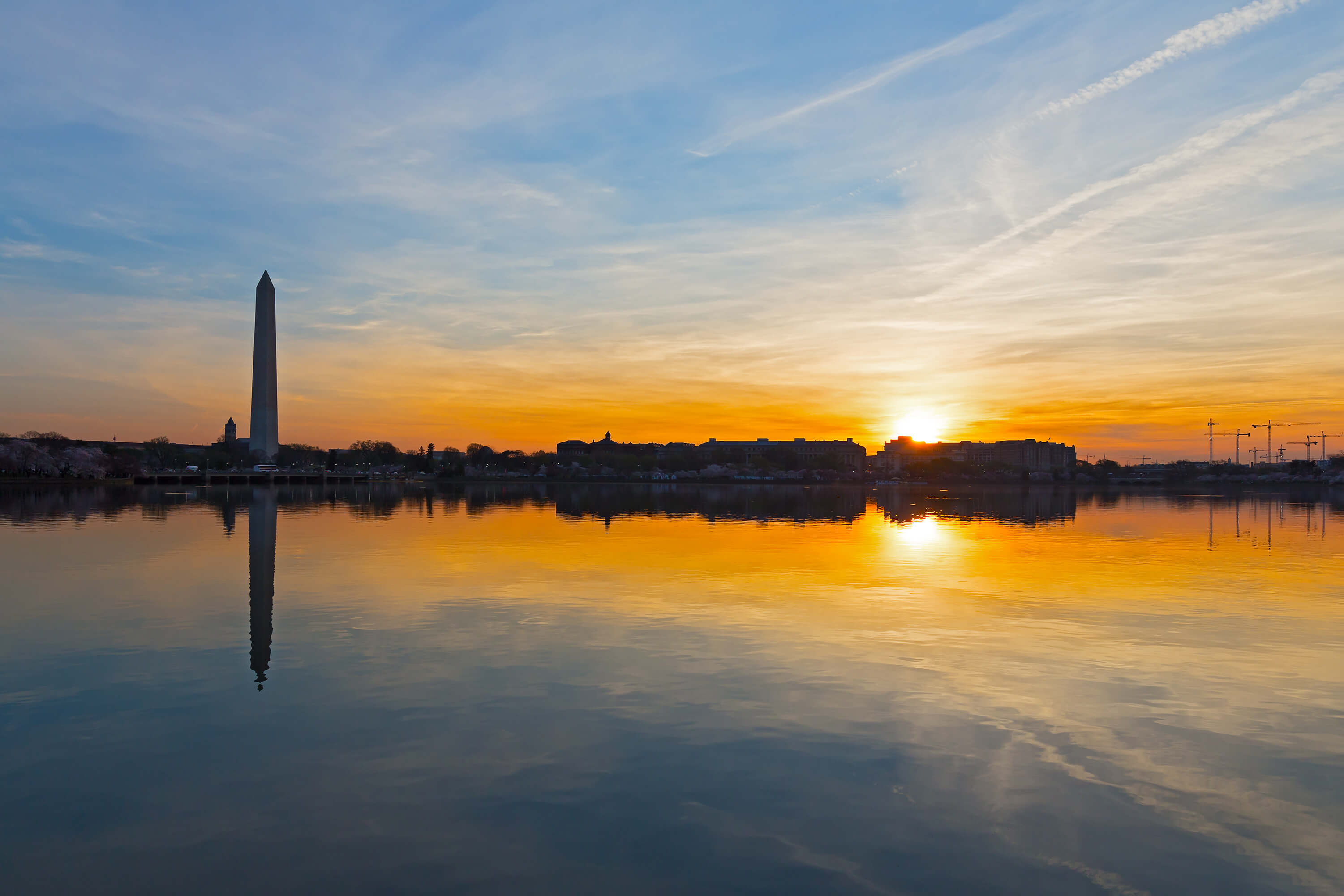 washington dc monument and skyline at sunset